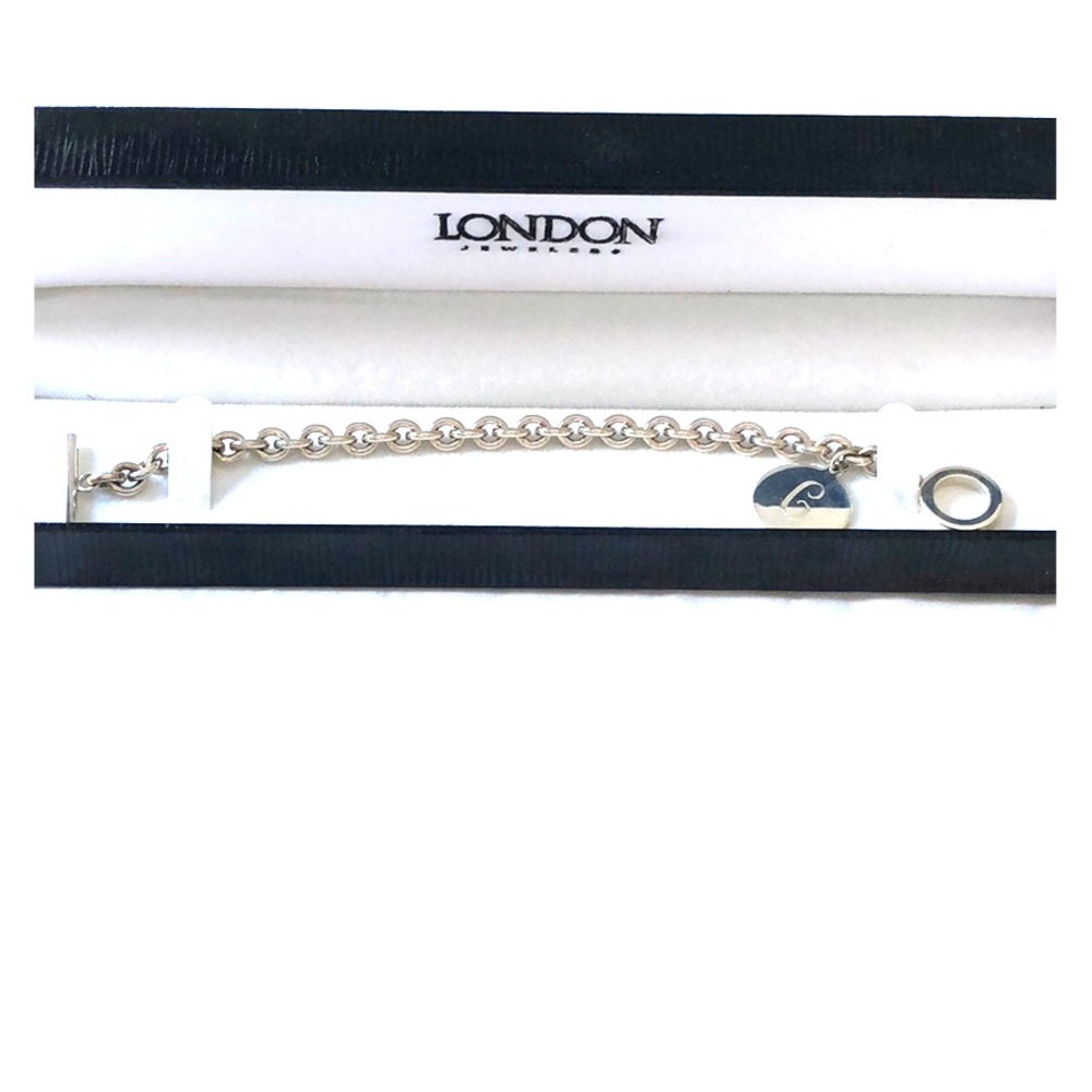 Silver charm bracelet with the letter C charm